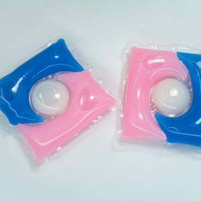 Three Chamer Laundry Pods With Milky All In Middle